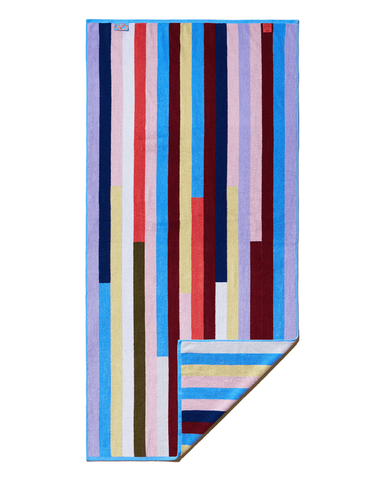 Colorful striped towel on a black background