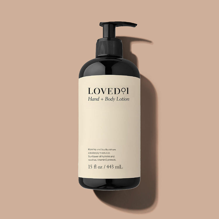 Lovedoi hand and body lotion bottle on a beige background