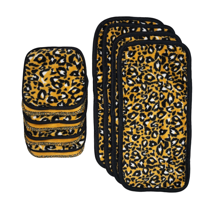 A set of makeup remover towels with a leopard print pattern, displayed in various folds and laid flat.