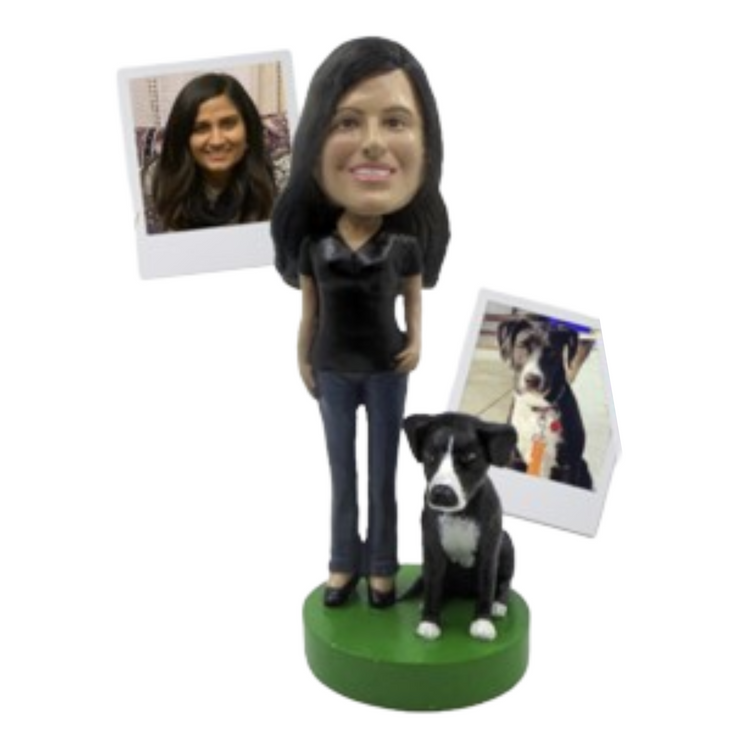 Bobblehead of a woman with a dog and two photos on a white background