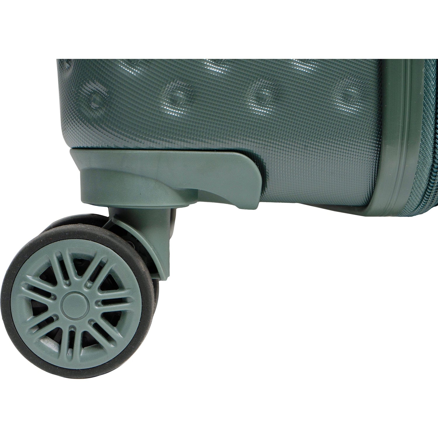 Close-up of a green suitcase wheel on a white background