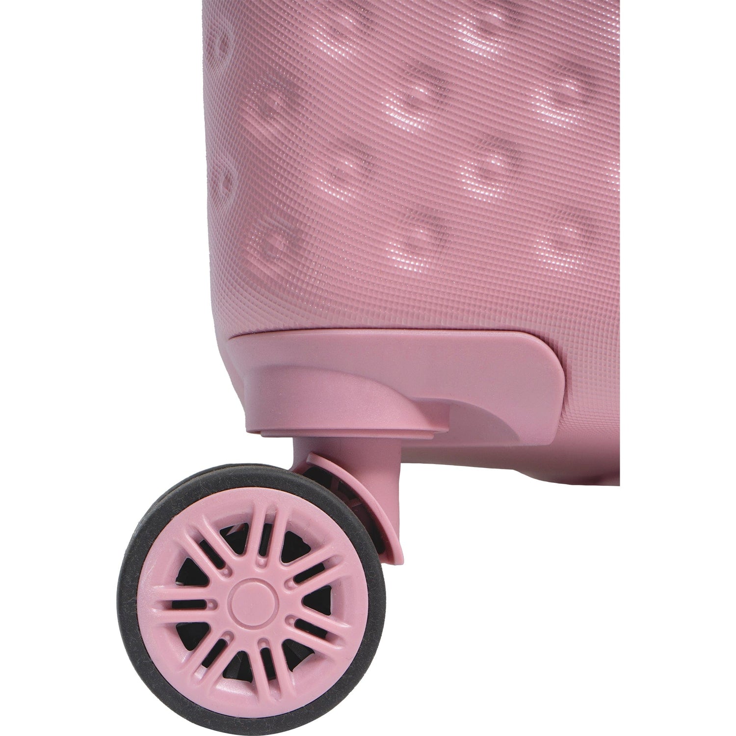 Close-up of a pink suitcase with a textured surface and black wheel on a white background