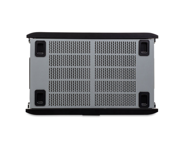 Back view of a black electronic device with cooling fins on a white background