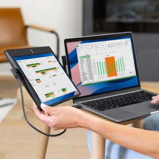 SIDETRAK portable monitor connected to a laptop on a white background