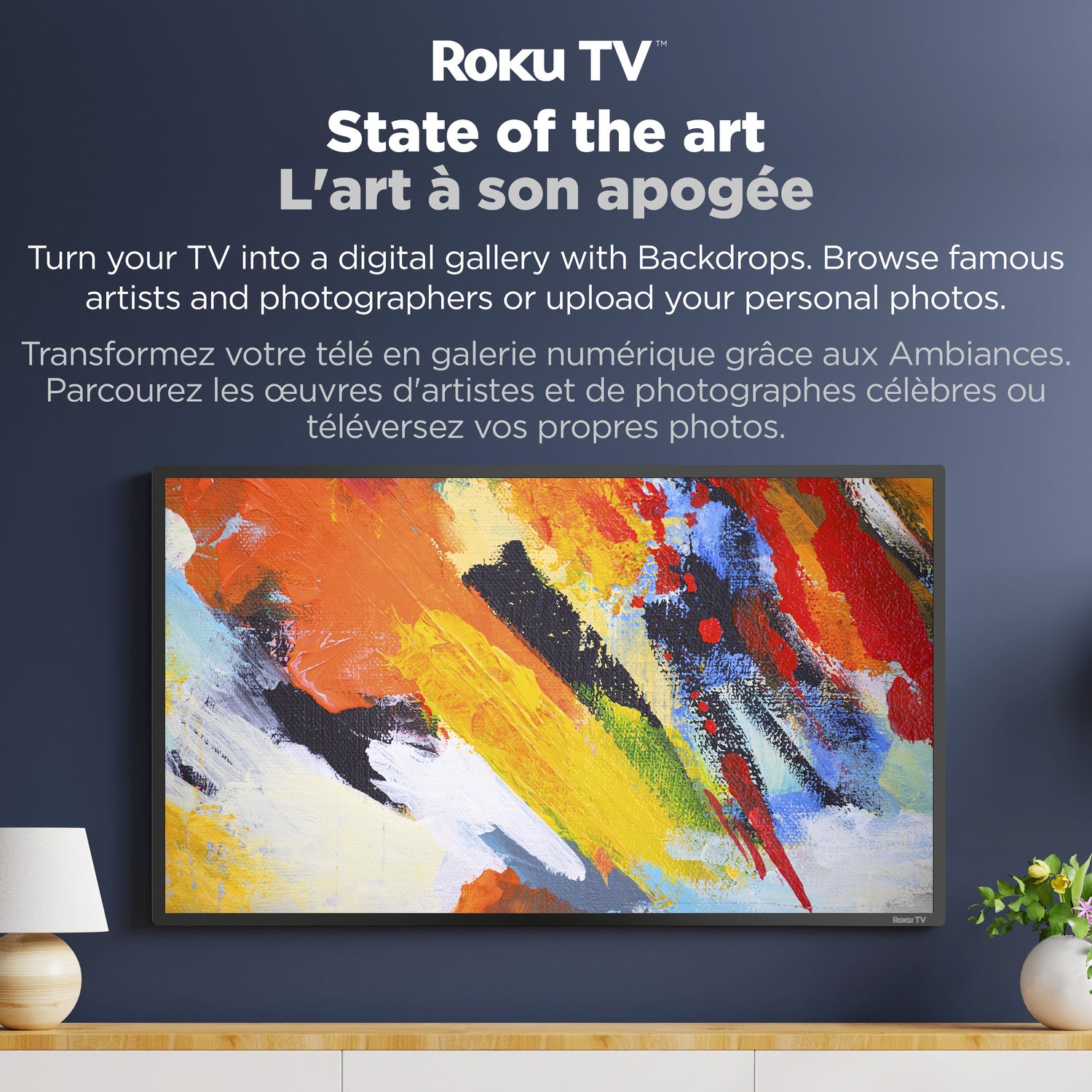 Roku TV with colorful abstract art display on a dark blue wall.