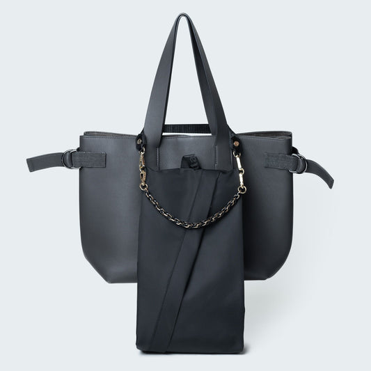 Black handbag with chain detail on a white background