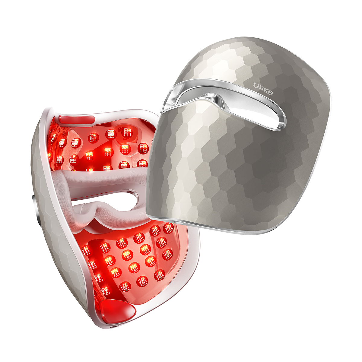 Beauty device with red light panel and metallic cover on a white background