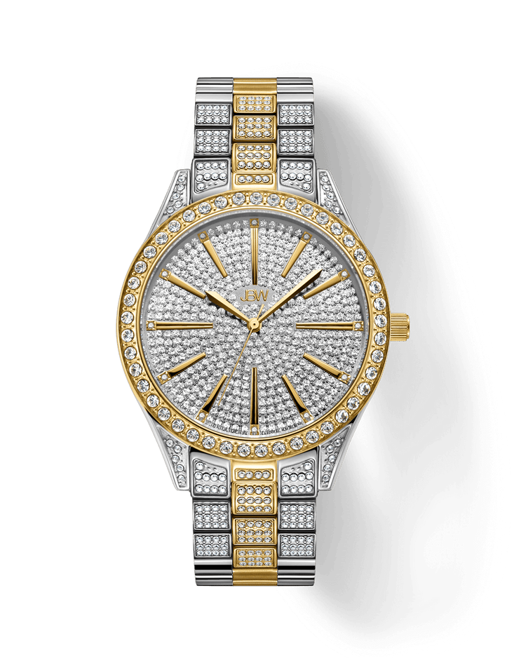 The JBW Cristal 39 | J6346D is a luxury diamond watch with a gold-plated stainless steel band, round face encrusted with crystals, Swiss movement, and gold-tone hour markers and hands.