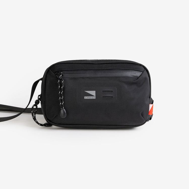 The Lander Rambler is 1L size has two compartments with water-resistant zippers, as well as a mesh divider and a key leash to stay organized