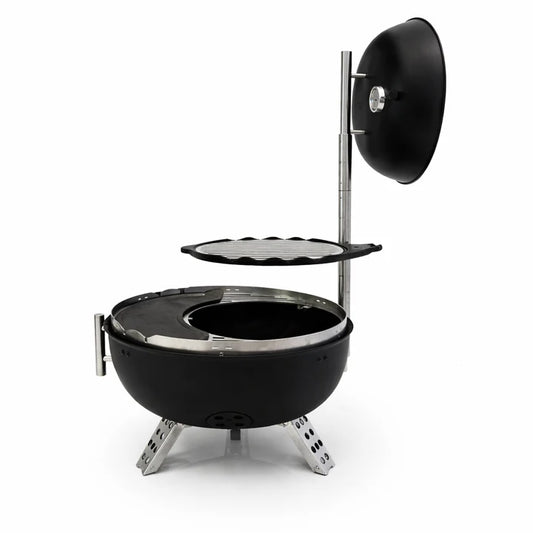 Grill with various foods on a dark surface