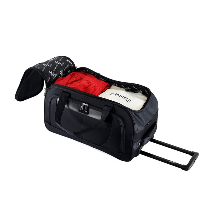 Black rolling duffel bag with red interior and visible brand name on a white background