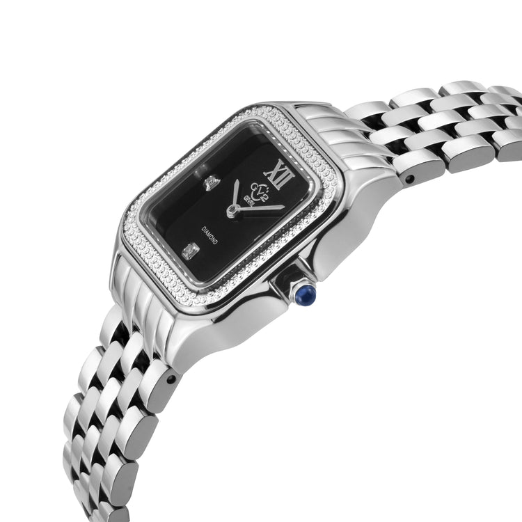 Silver watch with black face and blue gemstone on a white background