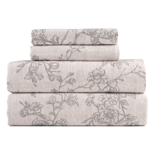 Stack of floral-patterned sheets on a white background