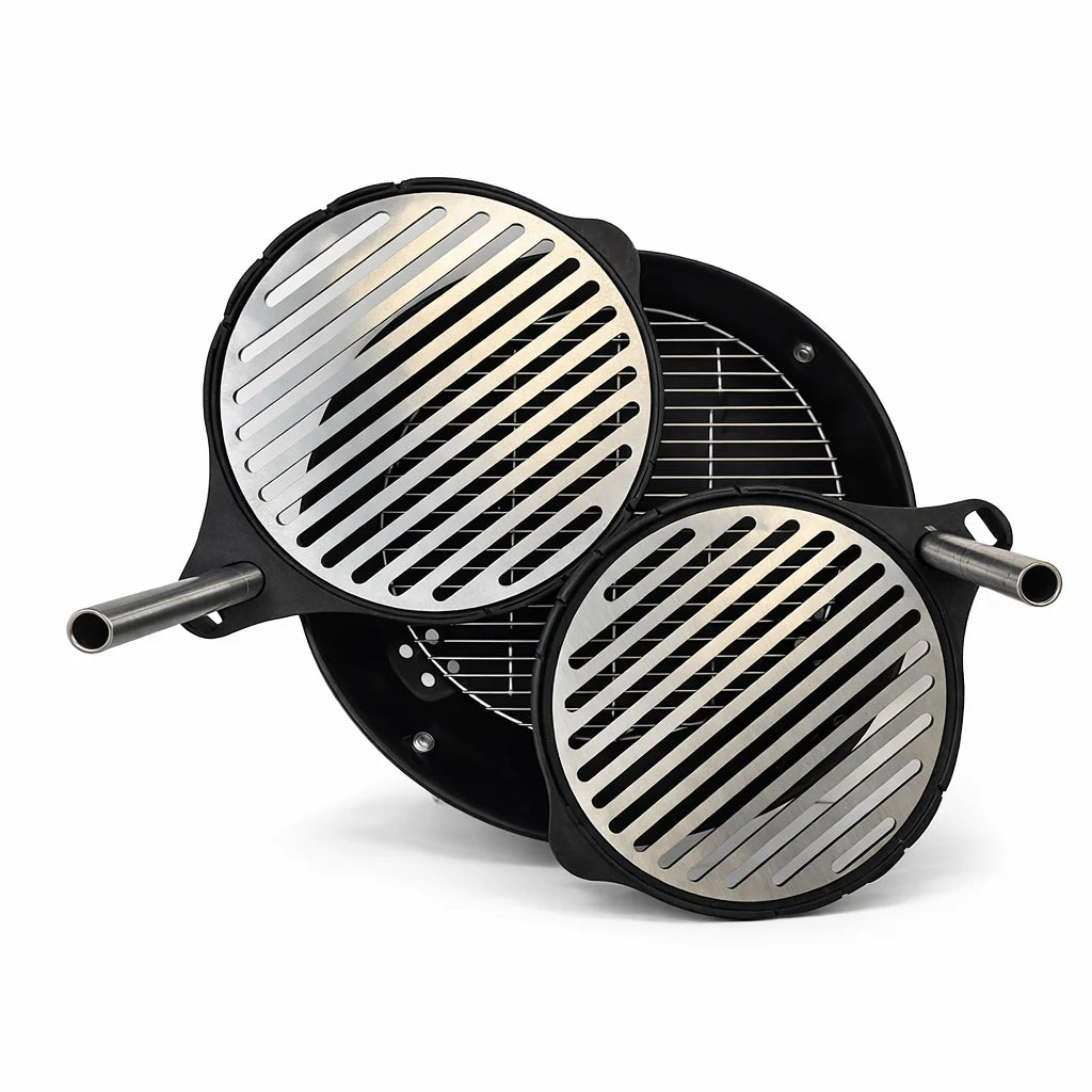 Set of two black frying pans with metallic grates on a white background