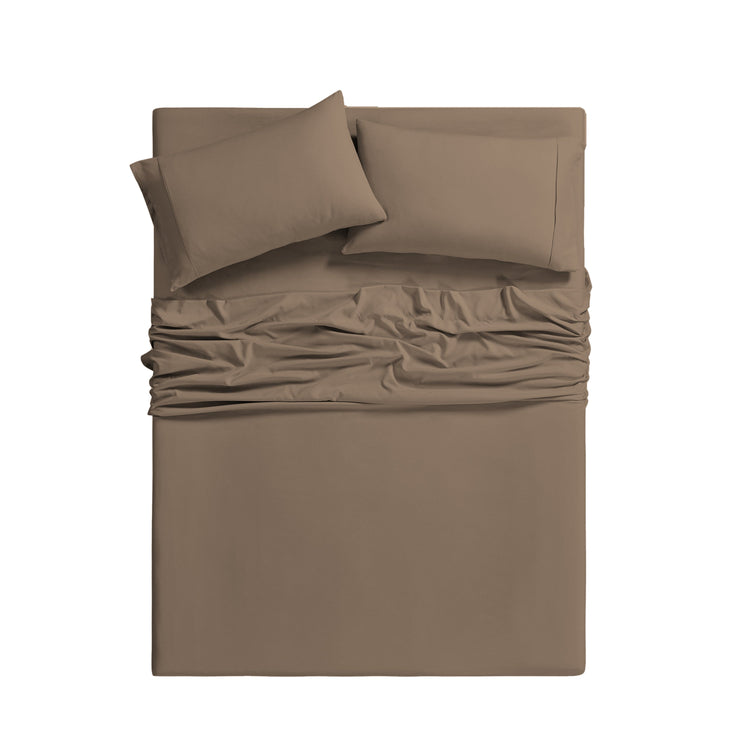 Brown bed sheet set with two pillows on a white background
