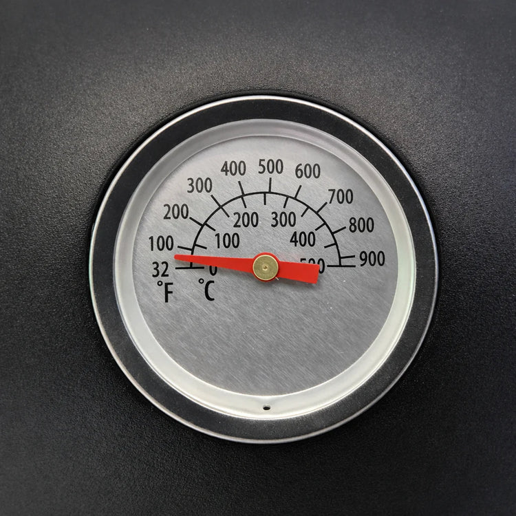 Temperature gauge with red needle on a black background