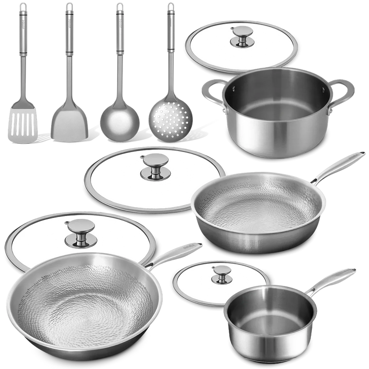 Set of stainless steel cookware including pots, pans, and utensils on a white background