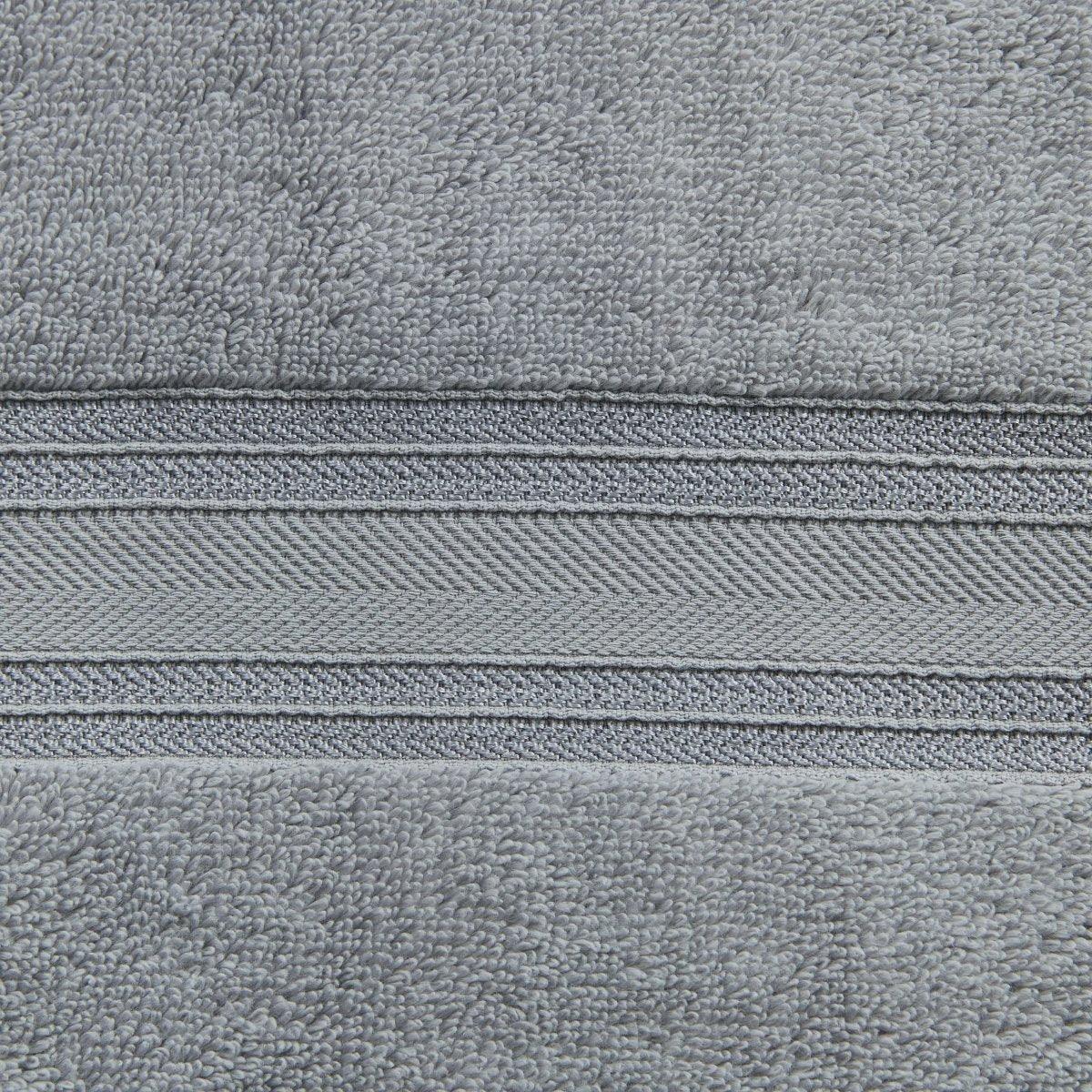 Close-up of gray fabric with a zipper