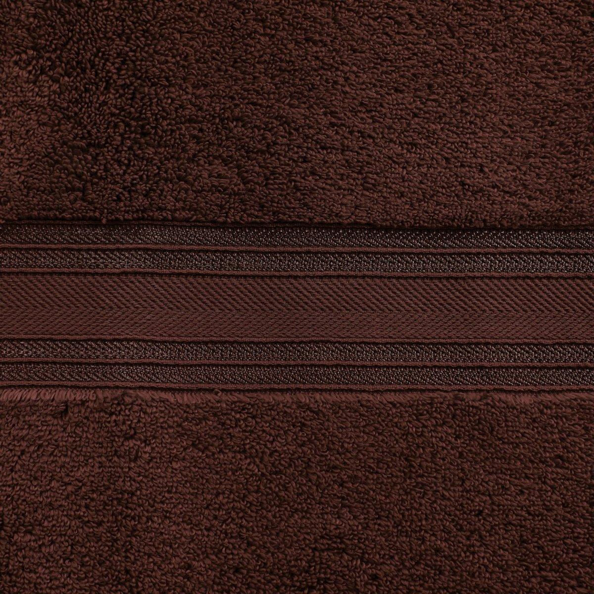 Close-up of a brown textured fabric with a zipper