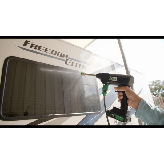 A Zippi Hydro Cleaner Deluxe with a black color scheme, including a gun handle, hose, nozzles, a carrying case, and other accessories.