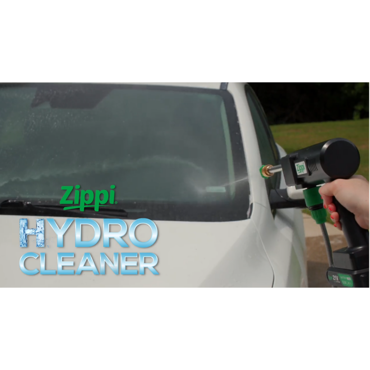 Person using a Zippi Hydro Cleaner on a car window