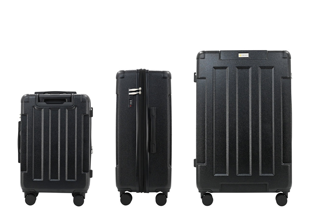 Three black suitcases of different sizes on a white background