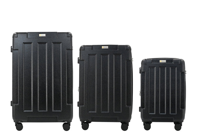Three black suitcases of different sizes on a white background