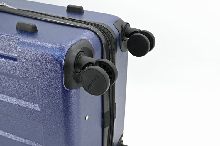 Blue suitcase with black wheels on a white background