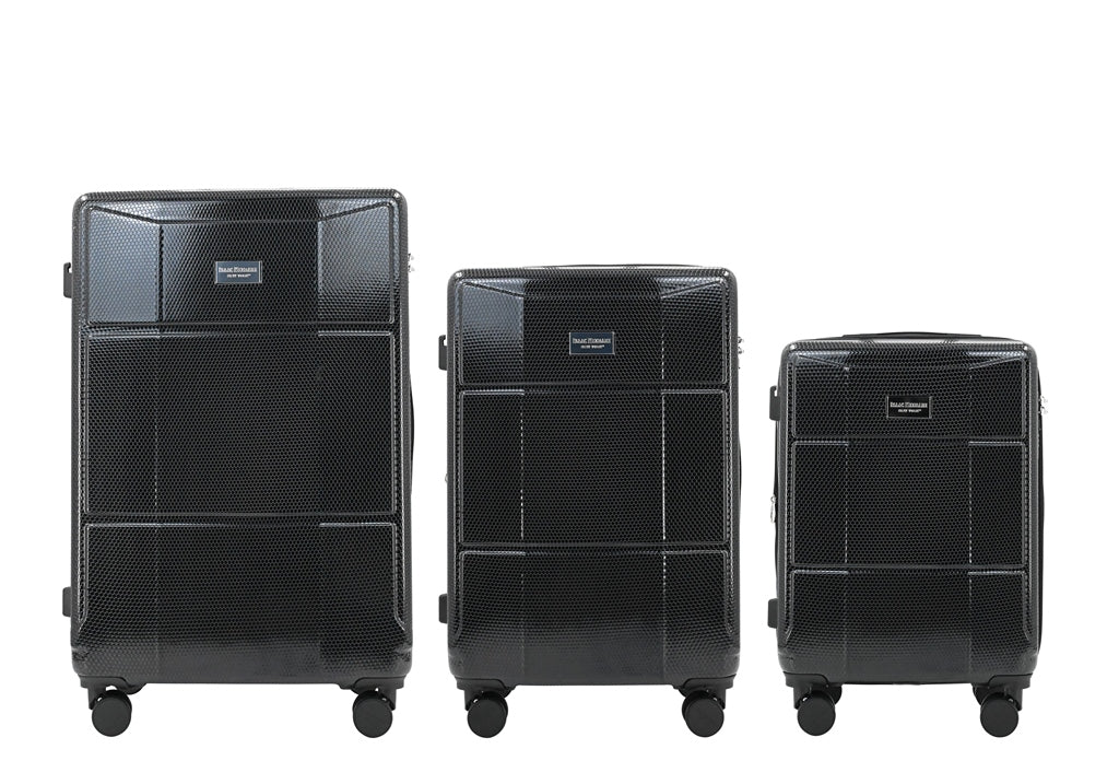 Three black suitcases of different sizes on a white background