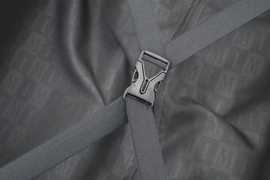 Set of black suitcases with wheels on a white background