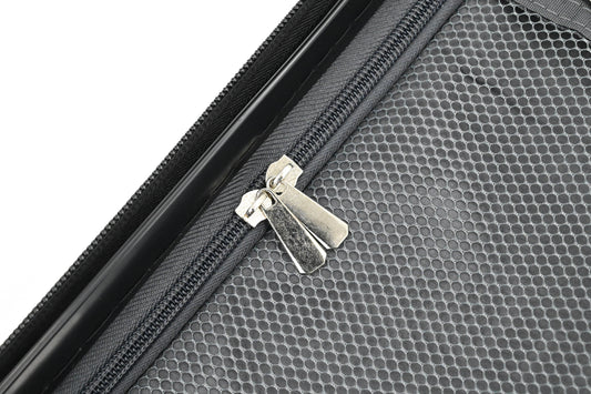 Set of black suitcases with wheels on a white background