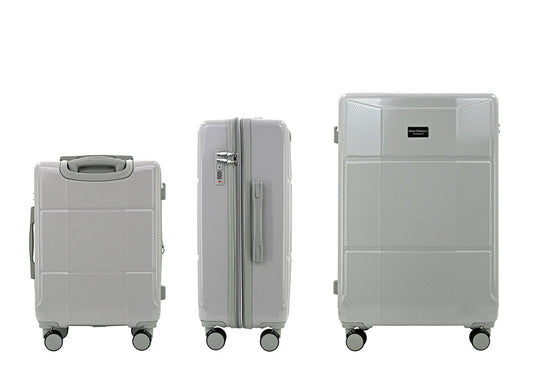 Set of black suitcases with wheels on a white background