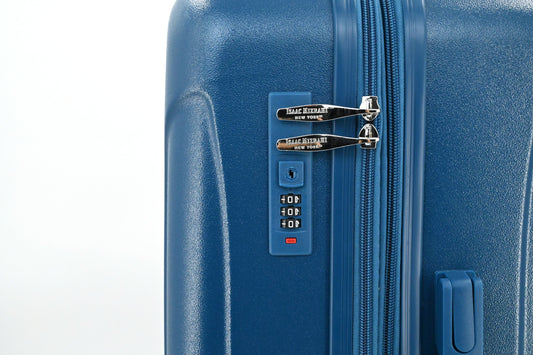 Set of three blue suitcases with wheels on a white background