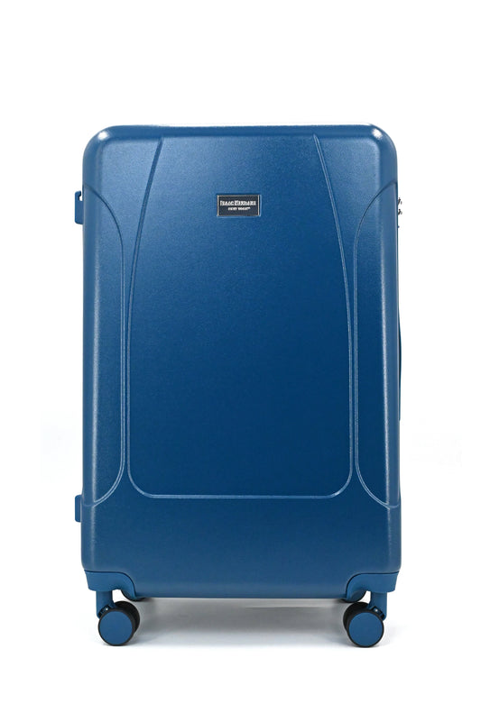 Set of three blue suitcases with wheels on a white background