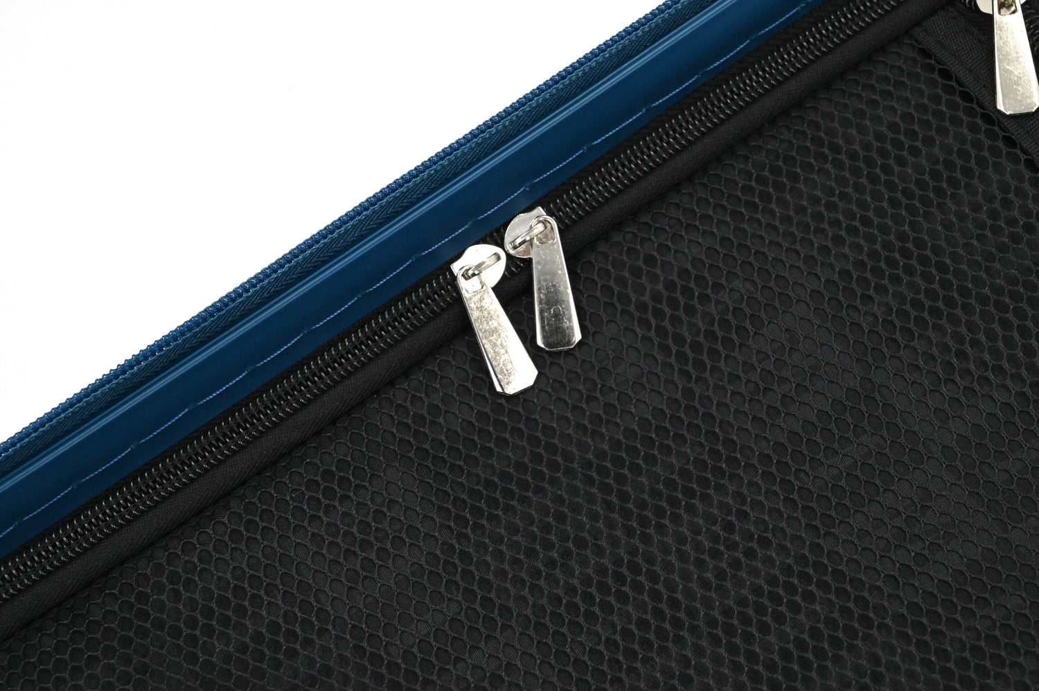 Close-up of a textured black surface with a blue border and metal clips.