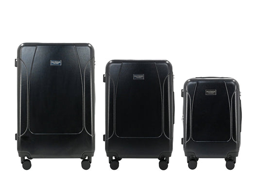 Set of three blue suitcases with wheels on a white background