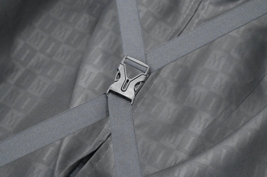 Set of three blue suitcases with wheels on a white background