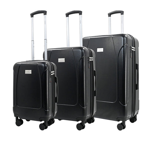 Set of three blue suitcases with wheels on a white background