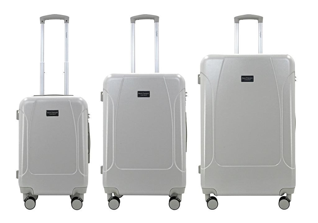 Three gray suitcases of different sizes on a white background