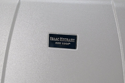 Set of three blue suitcases with wheels on a white background