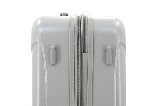 Set of three blue suitcases with wheels on a white background