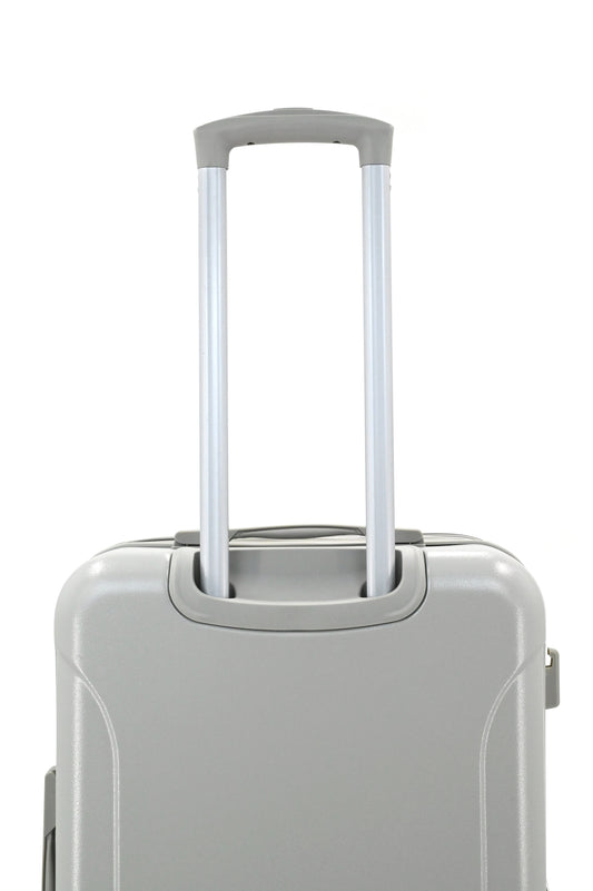 Set of three blue suitcases with wheels on a white background
