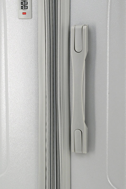 Set of three blue suitcases with wheels on a white background