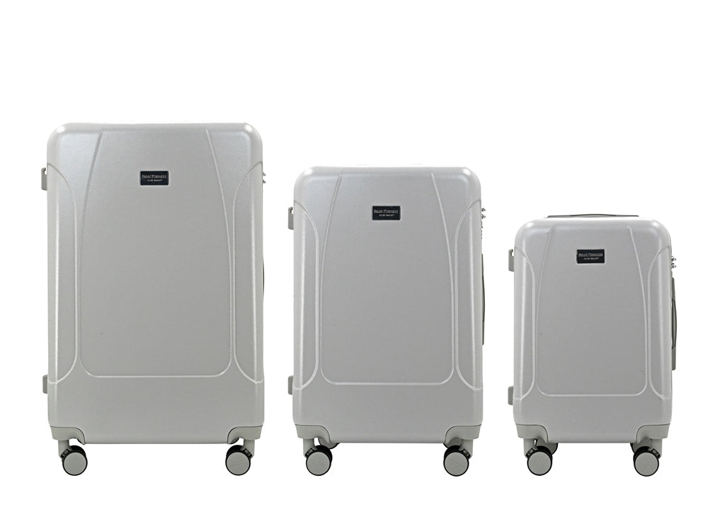 Three gray suitcases of different sizes on a white background