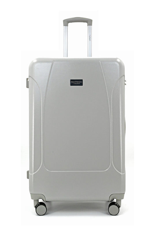 Set of three blue suitcases with wheels on a white background