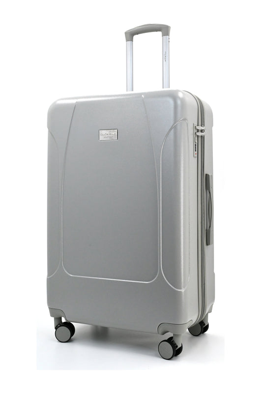 Set of three blue suitcases with wheels on a white background