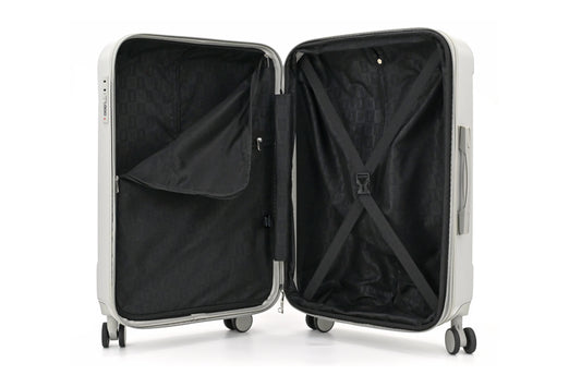 Set of three blue suitcases with wheels on a white background