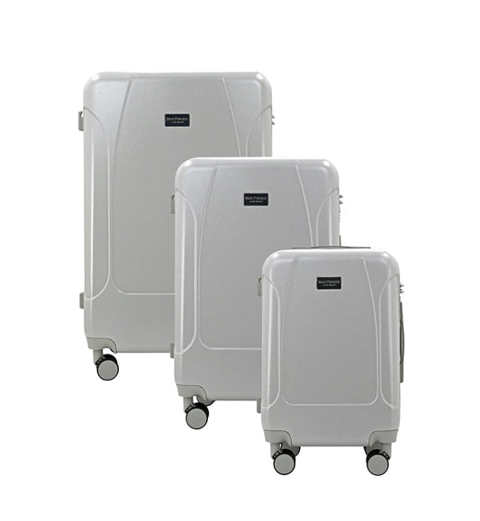 Set of three blue suitcases with wheels on a white background