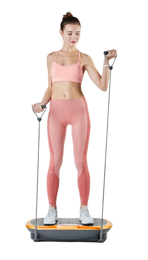 Woman using a vibration plate with resistance bands on a white background