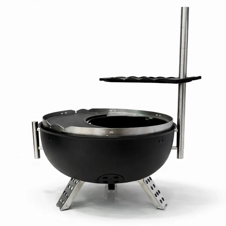 Black fire pit with metal stand and shelf on a white background